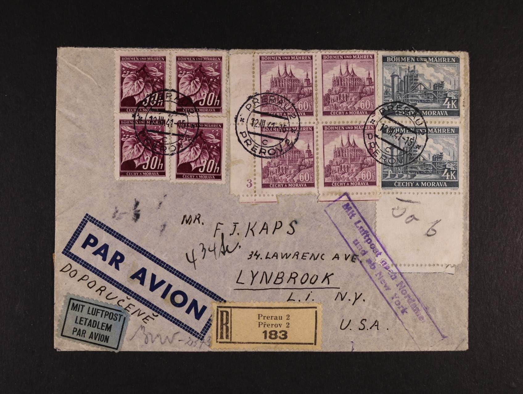 let. R-dopis do USA s pestrou zajímavou frankaturou, pod. raz. PRERAU 12.3.41 + rámečkové fialové raz. Mit Luftpost nach Nordamerika und ab New York, cenzurní páska a raz. + průch. a přích. raz., velm