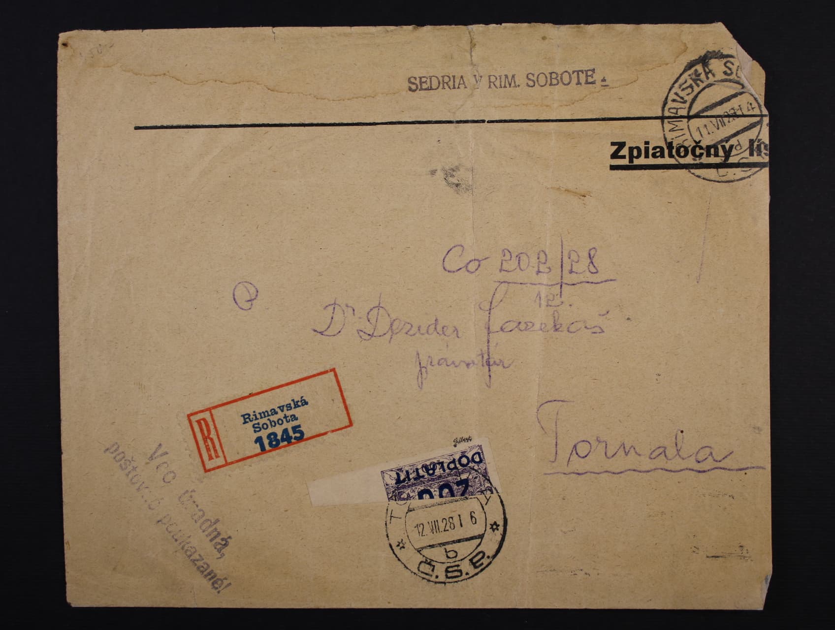 R-zpiatočný lístok (na pravé straně zastřižen), pod. raz. RIMAVSKÁ SOBOTA 11.7.28 + řádkové gum. raz. Vec úradná poštovné poukázané , vyplacené vodorvně půlenou zn. DL 28 s raz. TORNALA 12.7.28, zajím