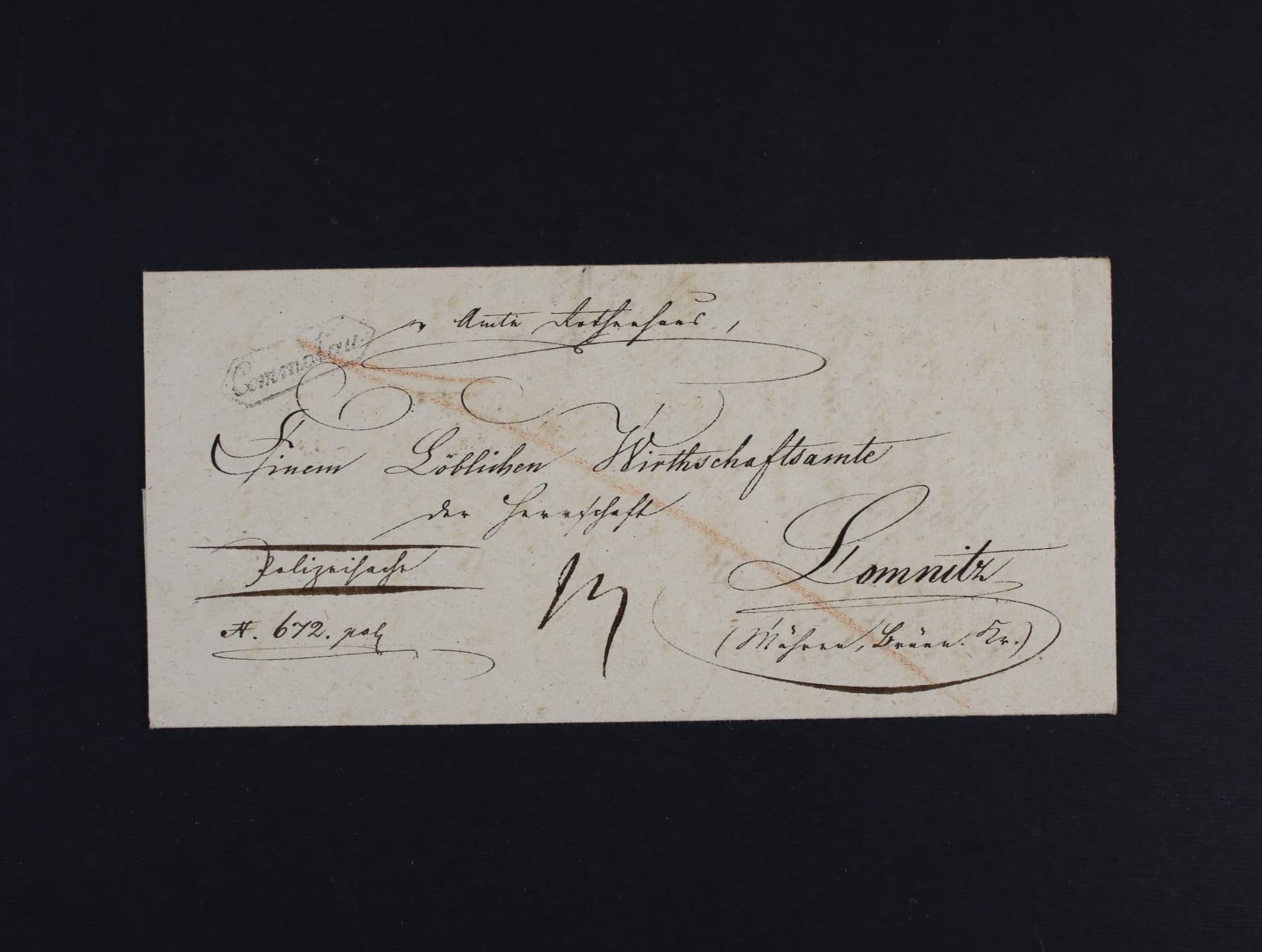Skl. dopis do Lomnice z r. 1835 s podacím rámeč. raz. COMMOTAU, průch. raz. BRÜNN, v horní části vodorovný registr. lom