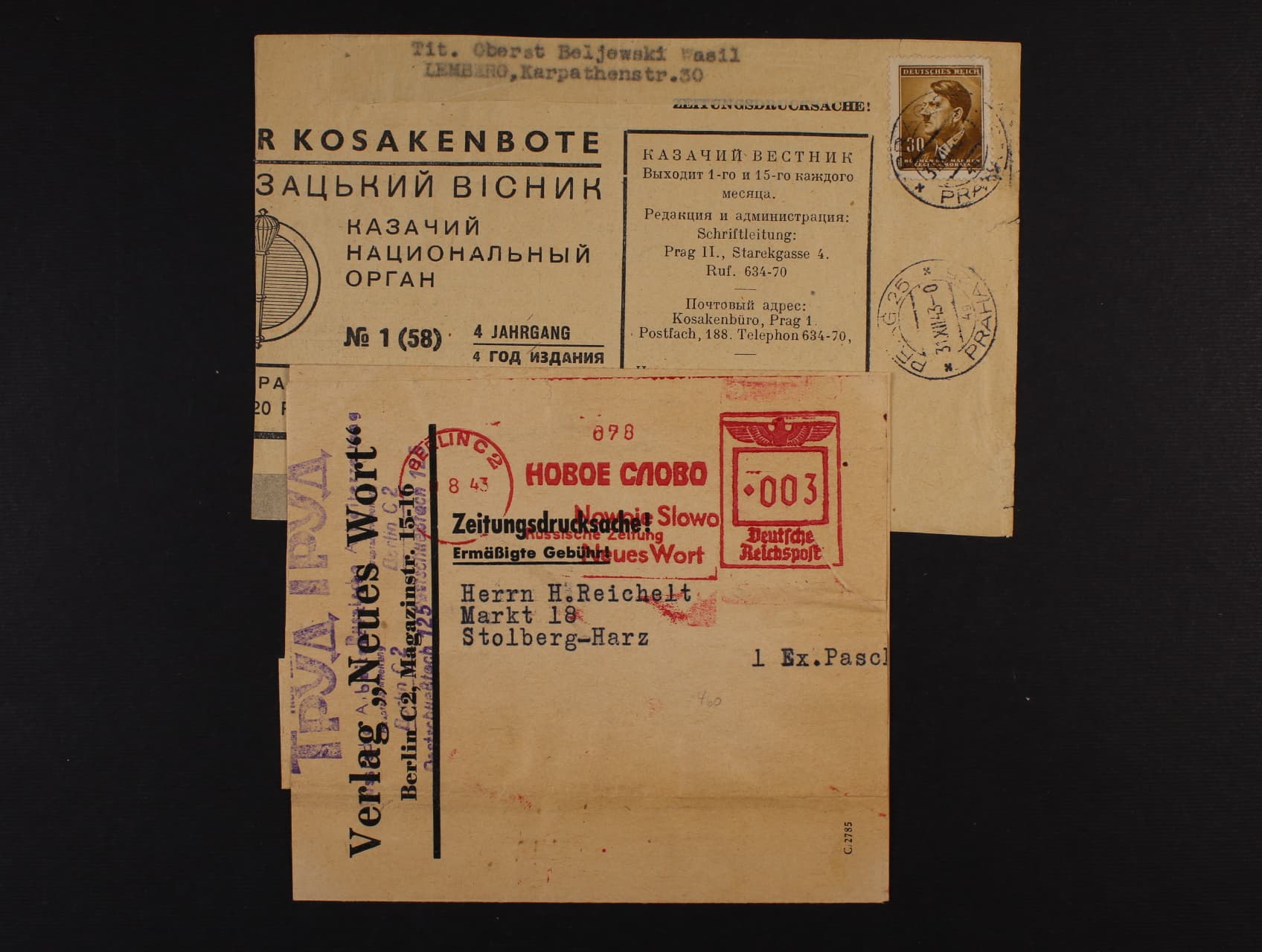 část novin KAZAČSKÝ VĚSTNIK s adresní páskou do Krakova, frank. zn. 30h A.H. s pod. raz. PRAG 25 3.12.43 - novinová protisovětská propaganda na území SSSR a novinový rukáv NOVOJE SLOVO