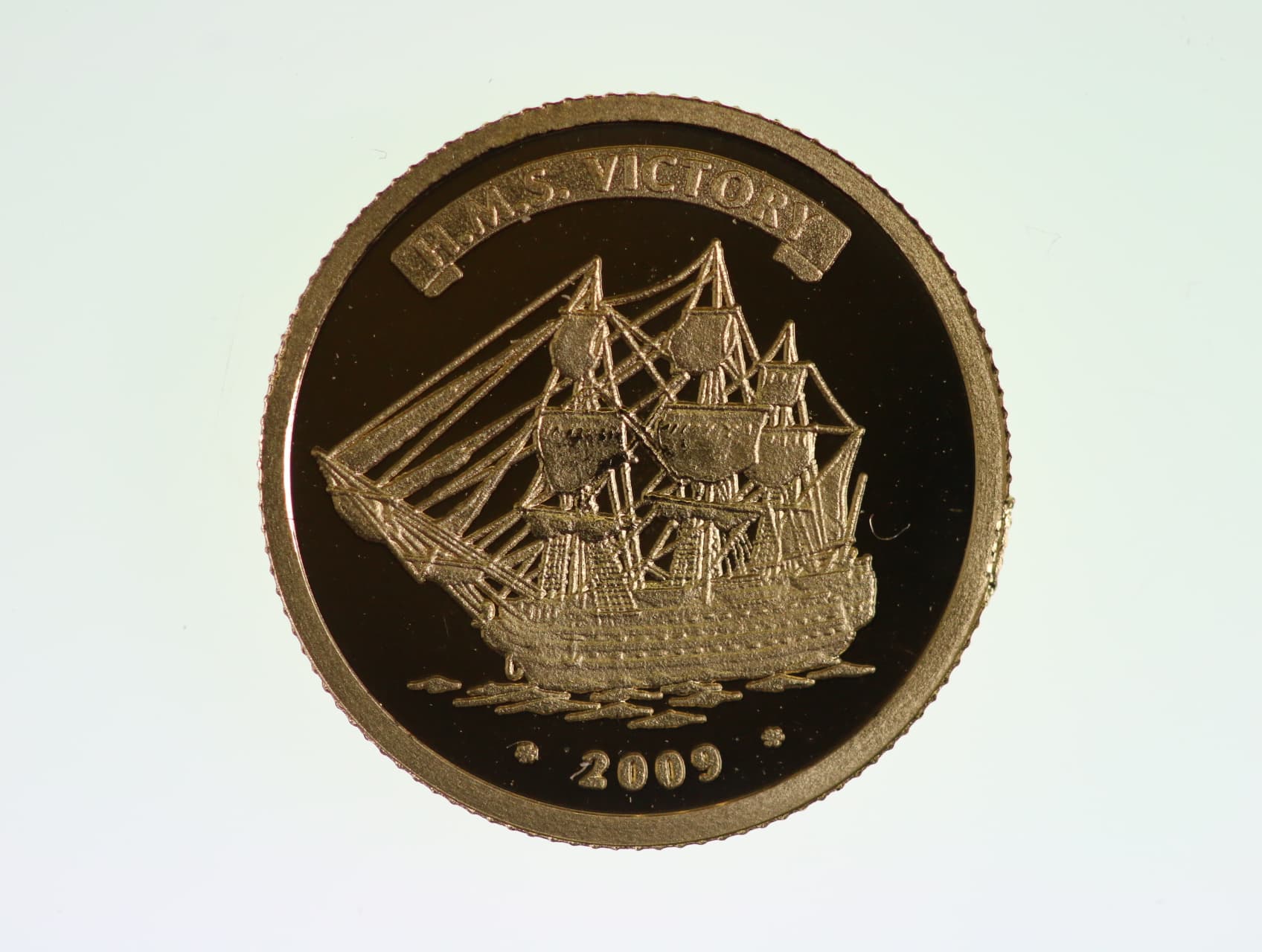 1500 Franků 2009, HMS Victory, Au 0.999, 1 g. průměr 13,92 mm