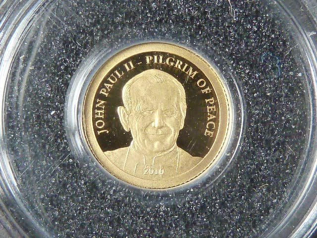 1 Dolar 2010 John Paul II., Au 999/1000, 0,5g, průměr 11 mm