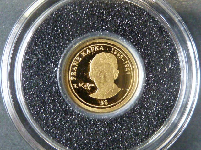 5 Dollars 2008 - Franz Kafka,  Au 999/1000, 0.5g, 11 mm + certifikát