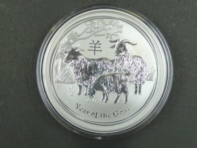 1 Dollars - 1 Oz (31,1050g) Ag - Rok kozy 2015, kvalita proof, Ag 999/1000, etue