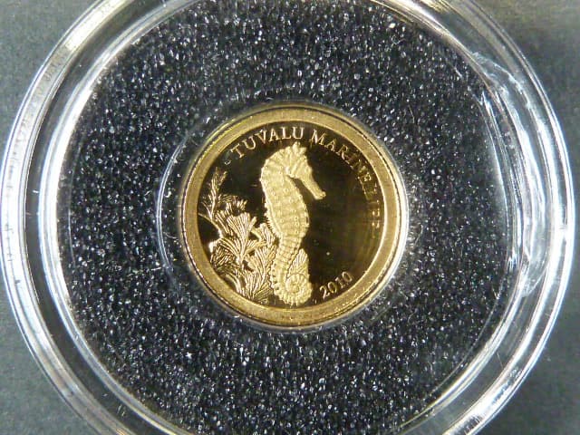 1 Dollar 2010 Marine life,  Au 0,999, 0,5g, náklad 5000 ks, průměr 11 mm