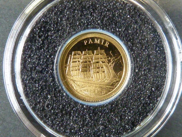 1 Dollar 2009 - Pamir, Au 0,999, 0,5g, náklad 25.000 ks, průměr 11 mm, KM 321