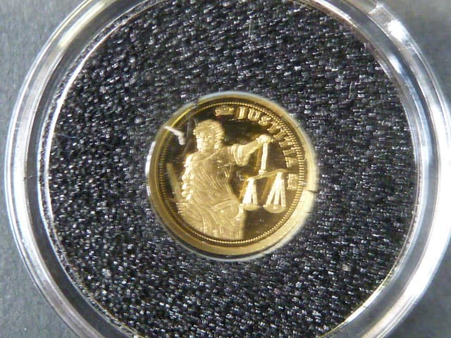 1500 Francs 2009 - Justitia, Au 0,999, 0,5g, průměr 11 mm