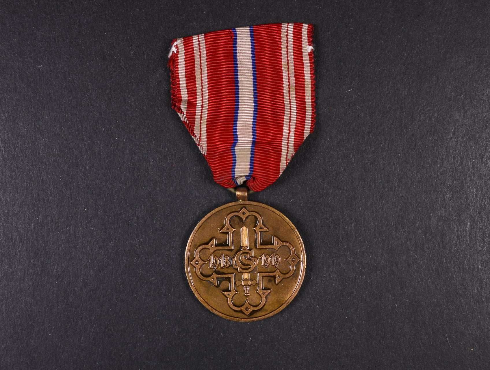 Pamětní odznak pro čs. dobrovolníky z let 1918-1919 s monogramem OP