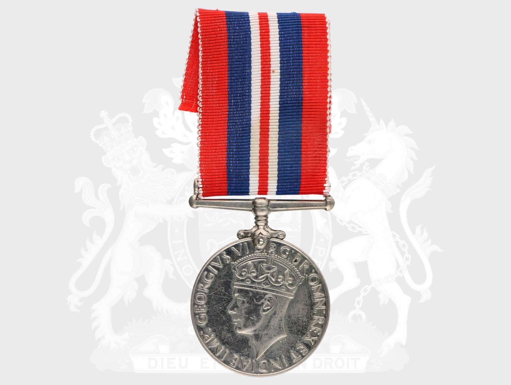 Válečná medaile 1939-45, na hraně opis V377378 E. F. Morton