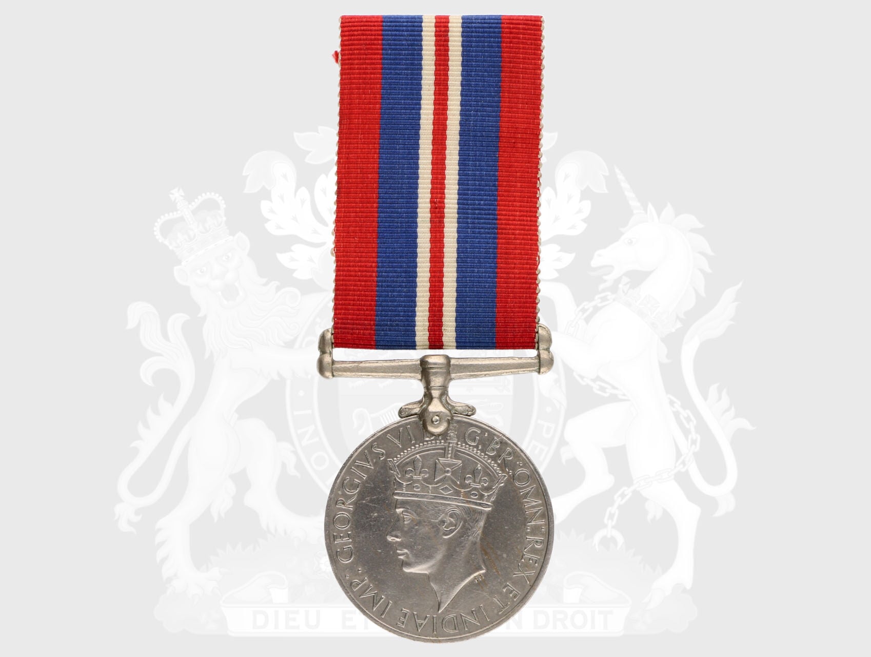 Válečná medaile 1939-45, na hraně opis M17205 J. J. JEFTHA