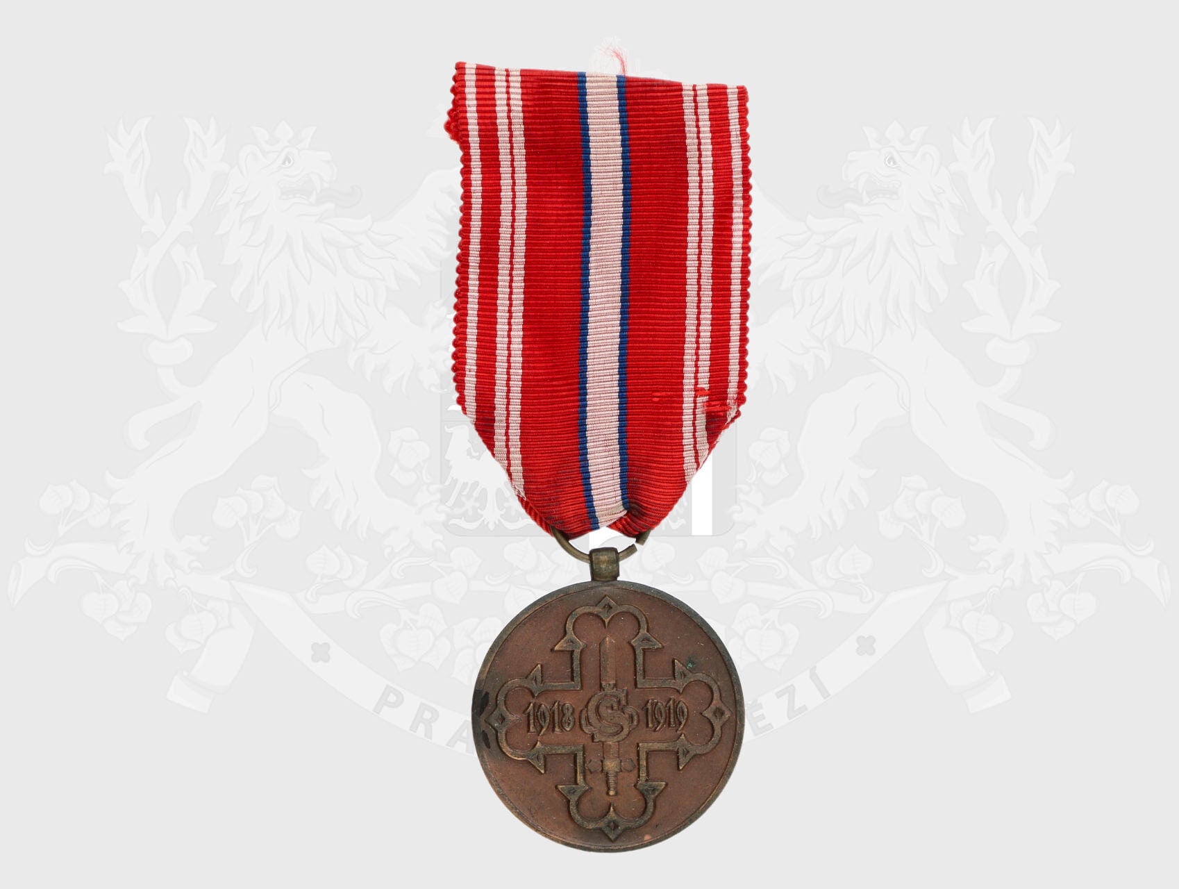Pamětní odznak pro čs. dobrovolníky z let 1918-1919 s monogramem OP
