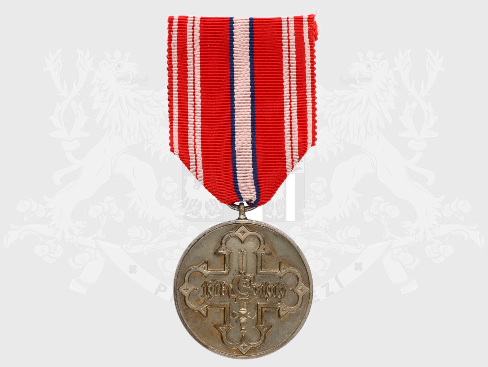 Pamětní odznak pro čs. dobrovolníky z let 1918-1919 bez monogramu OP, ražba v bílém kovu
