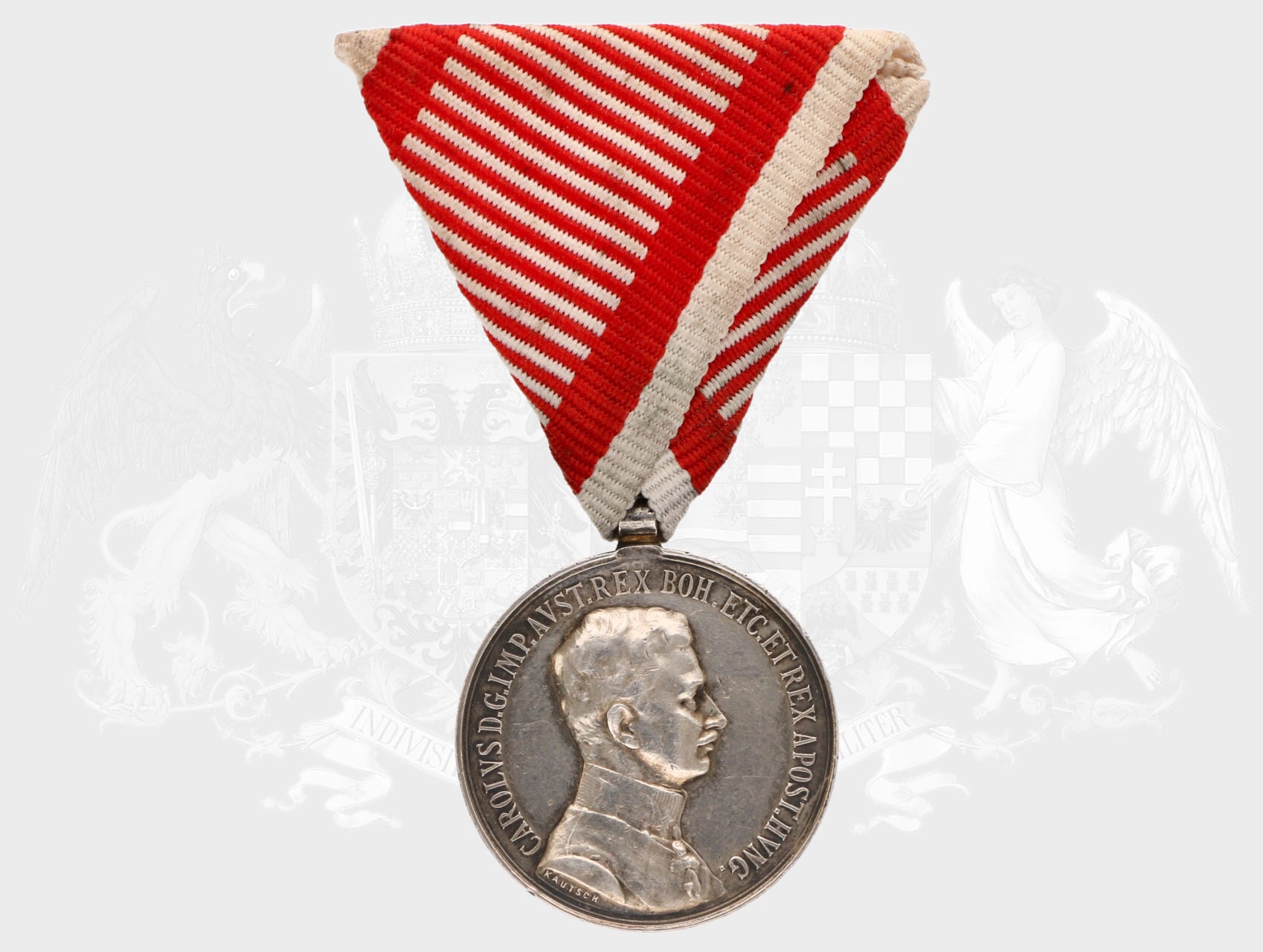Stříbrná medaile za statečnost 2. třídy, 9. vydání 1917-1918 Karel, na hr. punc hl. punc. úřadu Vídeň, A v kroužku, nová vojenská stuha