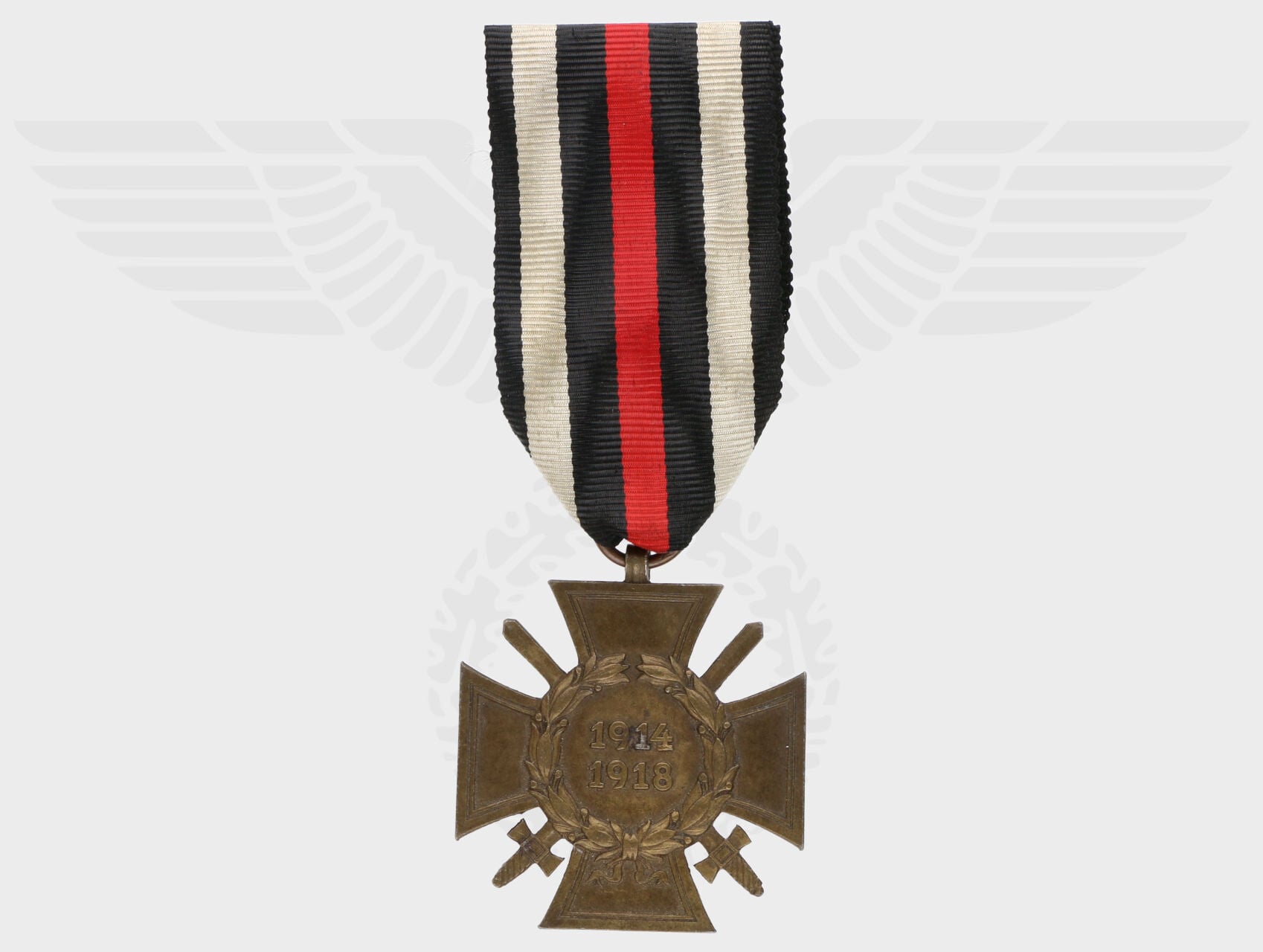 Čestný kříž 1914-1918 pro frontové bojovníky, na reversu značka výrobce W.D.