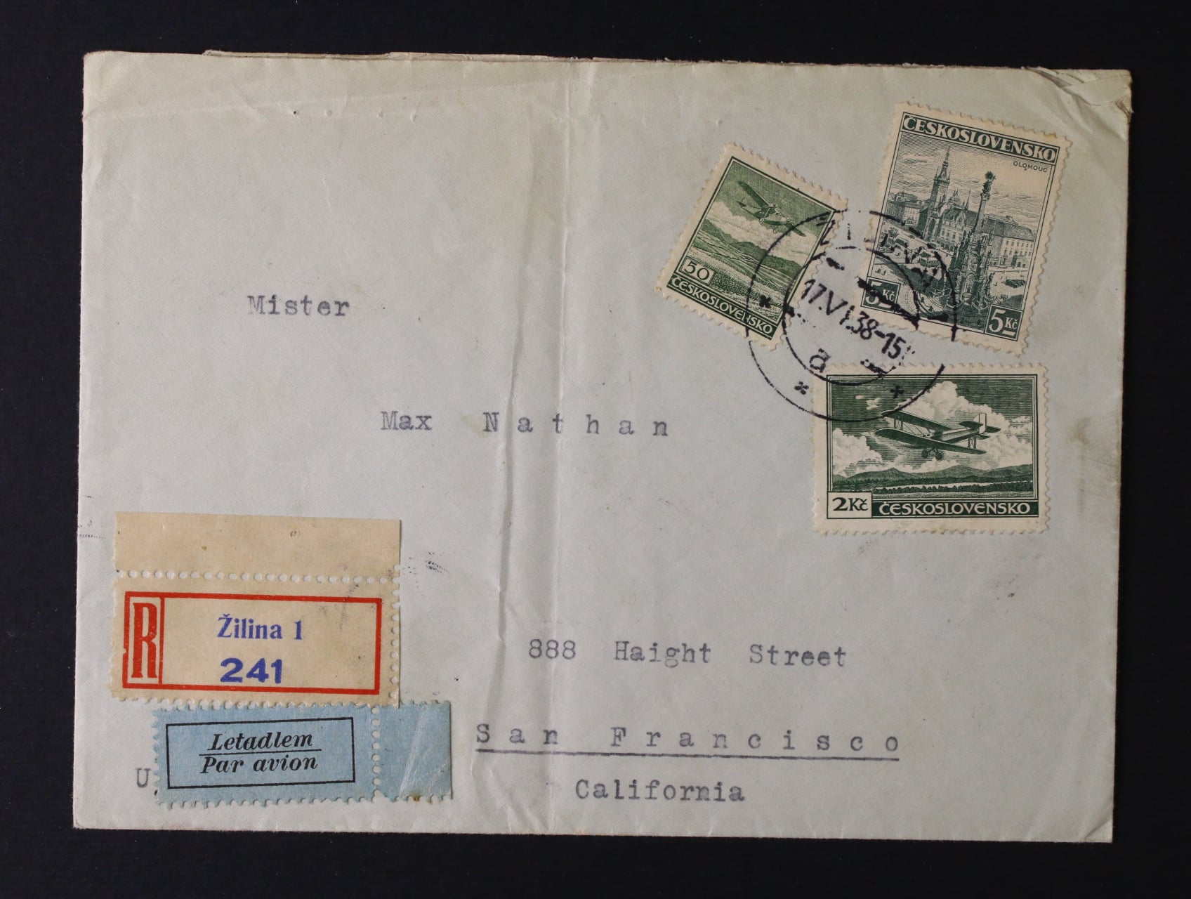 R-let. dopis do USA z r. 1938 frank. mj. zn. L č. 7 a  9, průch. a přích. raz.