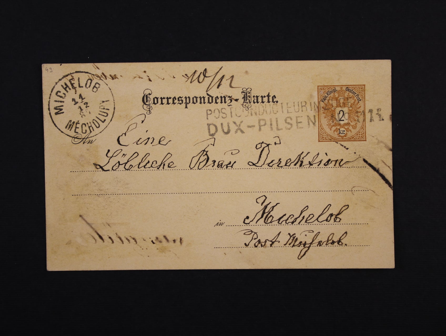 KL 2kr Doppeladler do Měcholup s pod. řádk. raz. POSTCONDUCTEUR IM ZUGE DUX - PILSEN No. 1114 + přích. raz., zajímavé