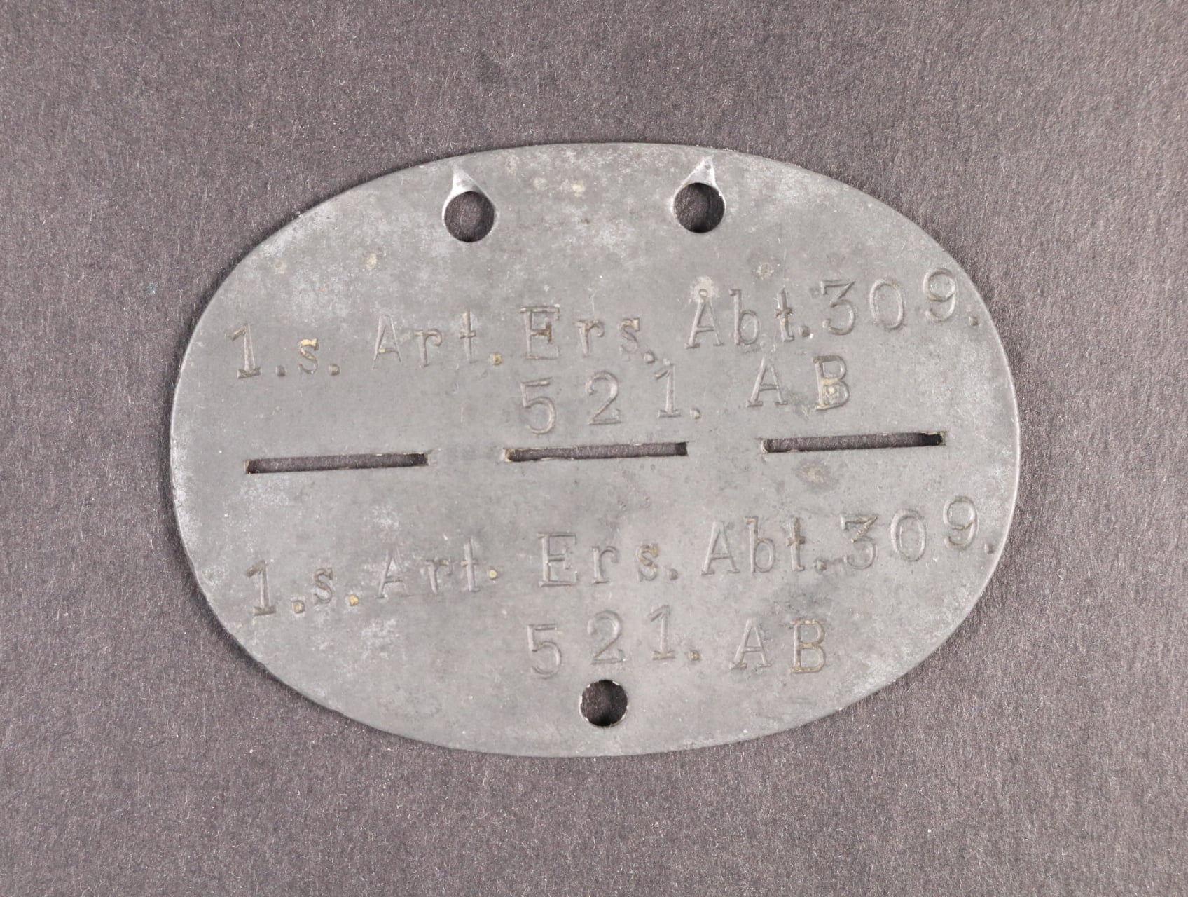 Identifikační známka 1.s. Art. Ers. Abt. 309