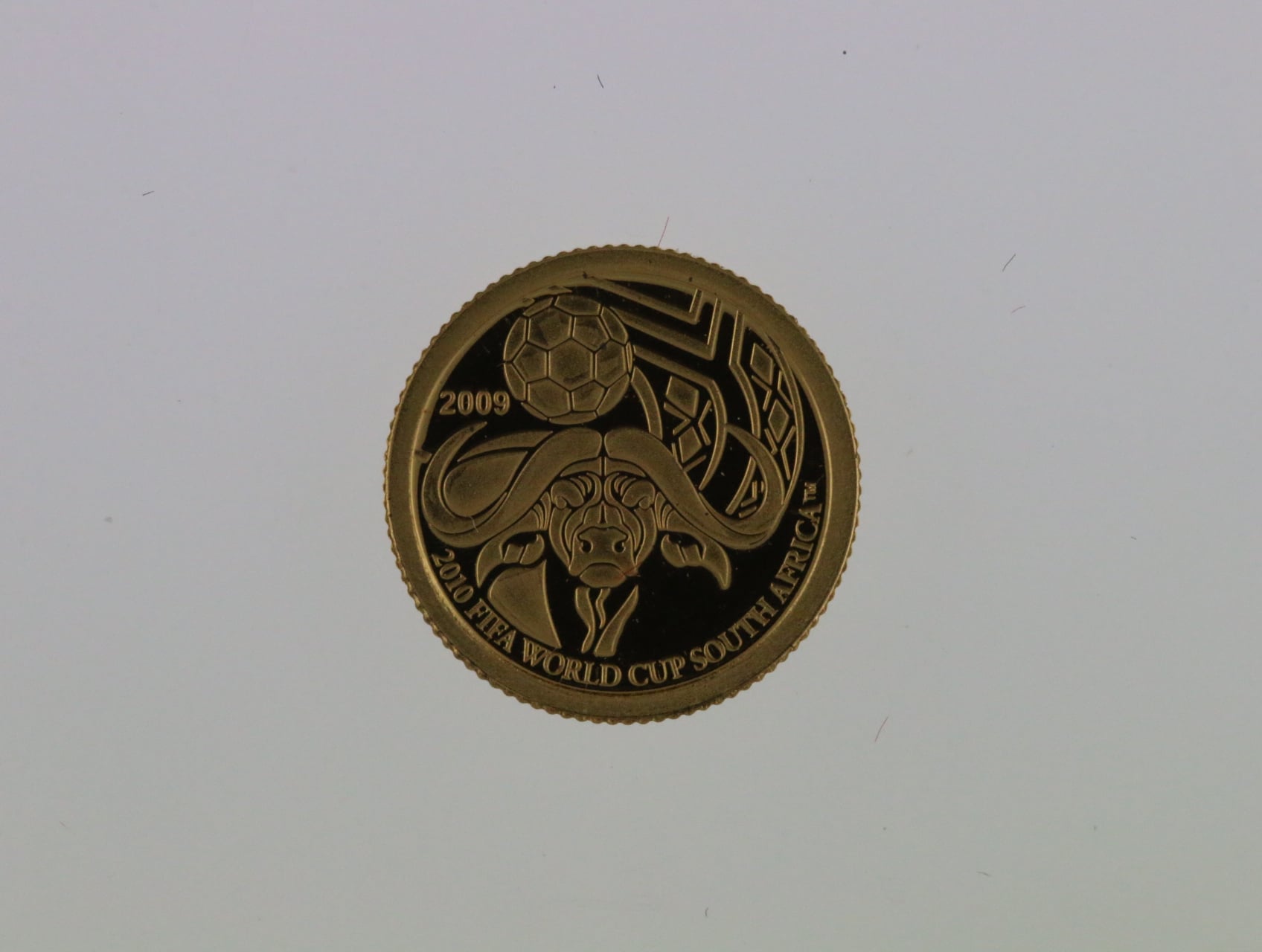 1 Dolar 2009, MS fotbal Jižní Afrika 2010, Au 0.999, 0.5 g.