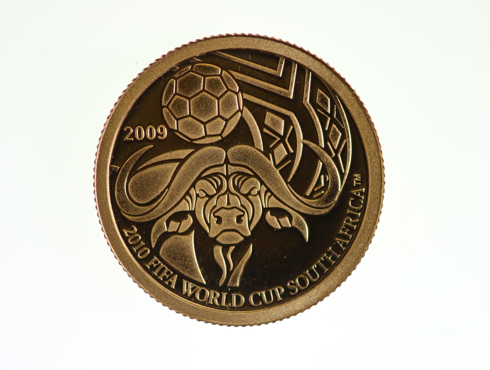 1 Dolar 2009, MS fotbal Jižní Afrika 2010, Au 0.999, 1 g., průměr 13,92 mm.