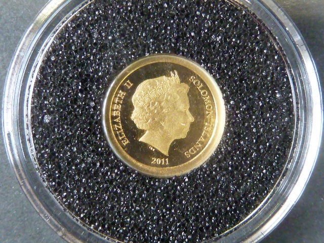 5 Dollars 2011 kompletní sada 7ks mincí Divy světa, Au 0,585, 0,5g, náklad 5000 ks, průměr 11 mm, KM 188-194