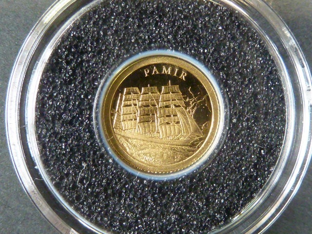 1 Dollar 2009 - Pamir,  Au 0,999, 0,5g, náklad 25.000 ks, průměr 11 mm, KM 321