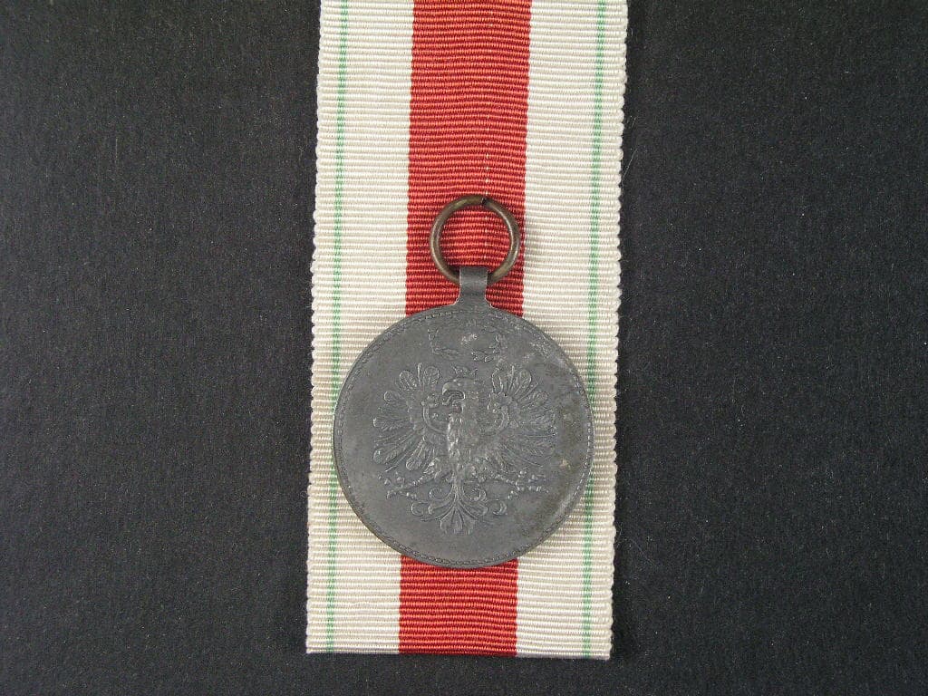 Tyrolská pamětní medaile na I. sv. válku z r. 1928, náhradní kov, původní stuha
