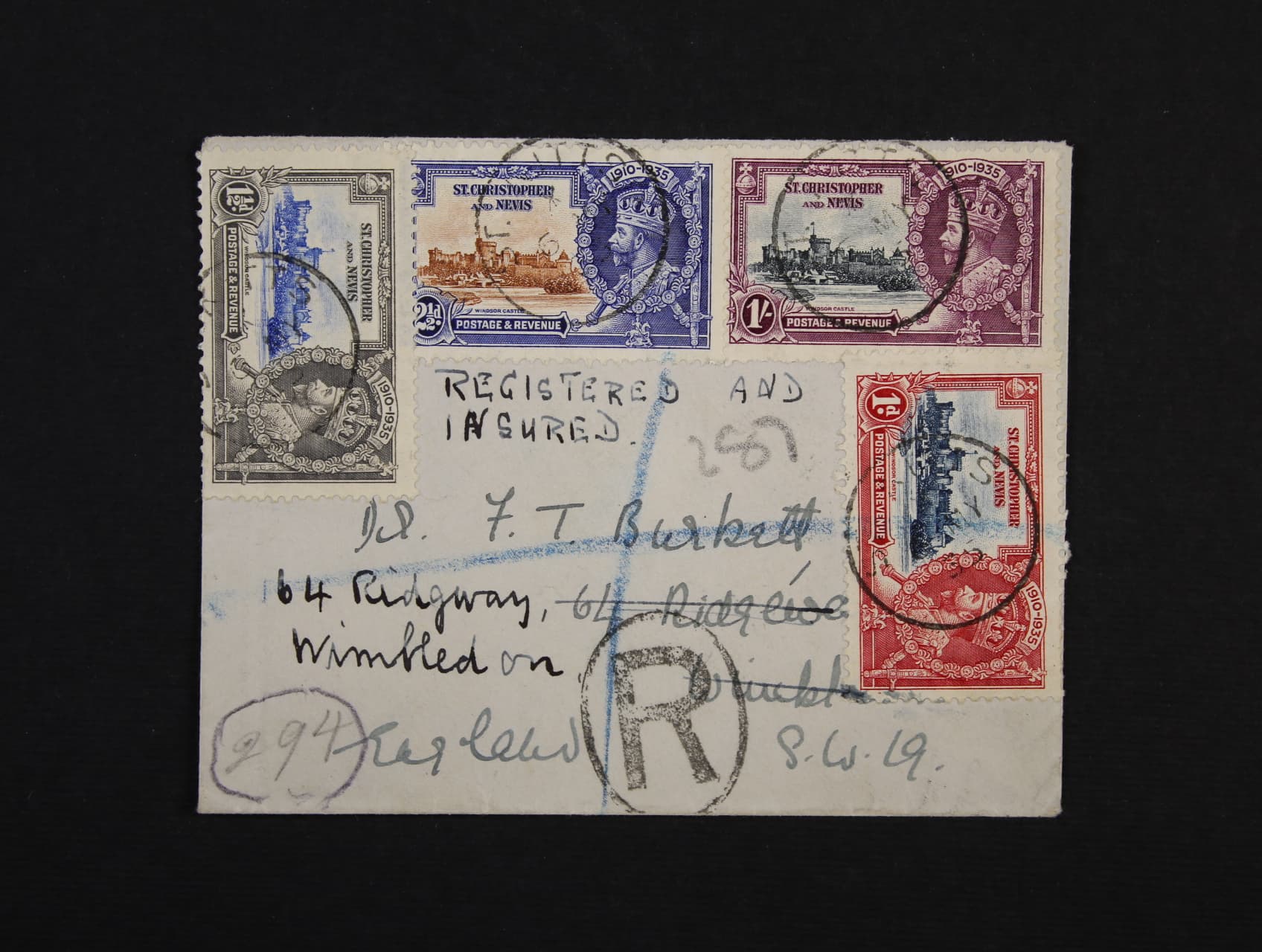 St. Christopher and Nevis - dosílaný R-dopis do Jižní Afriky frank. zn. Mi. č. 65 - 8, pod. raz. nečitelné, průch. raz. NEW YORK 14.5.35, přích. raz. WIMBLEDON S.W.A 24.5.35