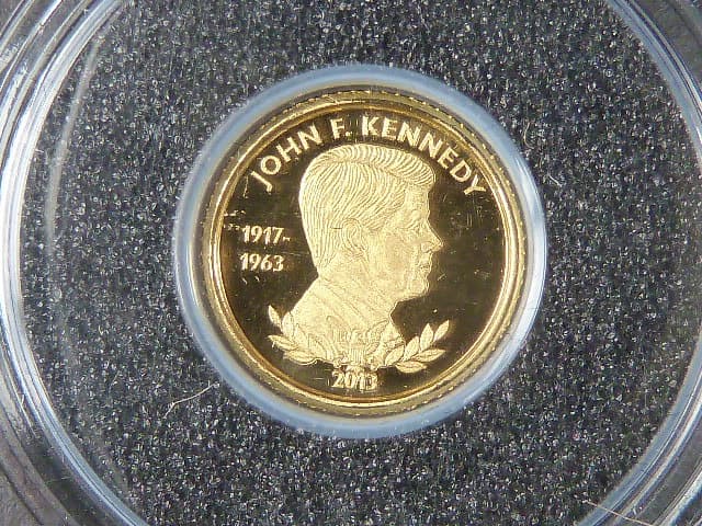 1500 Francs 2013 - J.F.Kennedy, Au 0,999, 0,5g, průměr 11 mm